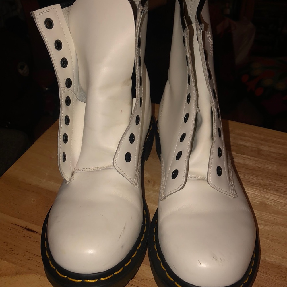 Dr. Martens Leather boots. Minimal wear. Some scuffs view pictures carefully.